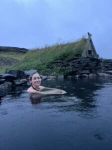 Soaking in the Hrunalaug hot spring with the turf roofed little hut behind me.