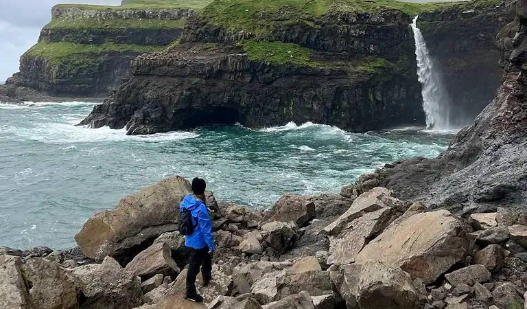 Me at a closer angel to see the iconic Mulafossur waterfall.