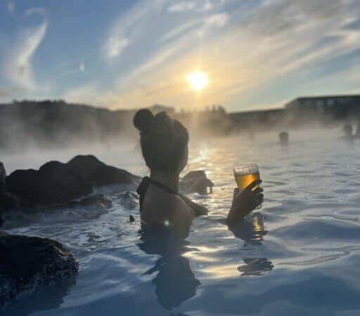 Soaking in the Blue Lagoon during sunset with a beer.