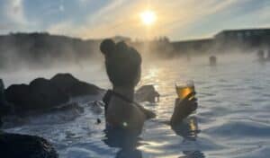 Soaking in the Blue Lagoon during sunset with a beer.