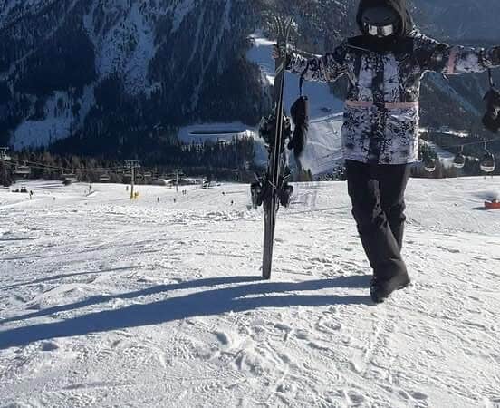 Alpine winter adventure at Dolomites, perfect for skiing and mountain landscapes.