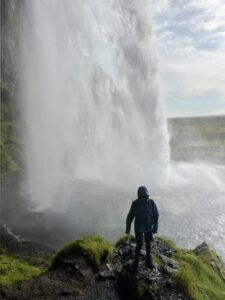 under the Seljalandsfoss waterfall