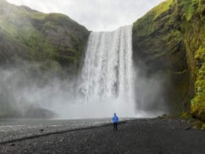Admiring Skogafoss waterfall