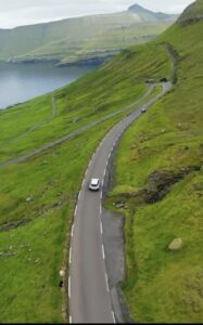 Drone shot driving to Gjogv 