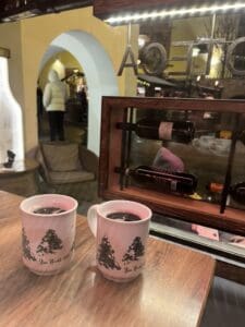 Drinking mulled wine at the christmas market in Orisei, Dolomites