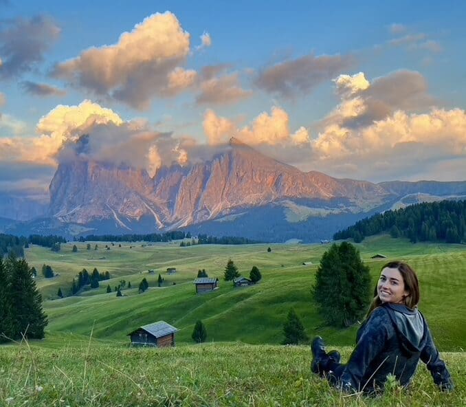 Sitting in the meadow at Alpe di Siusi